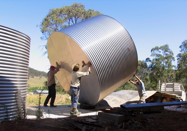 Jesse, Nick and Ryan manouvre the second tank towards its final resting place