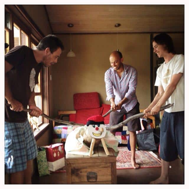 Floyd, Lawrence and Michael learning the way of Caga Tió