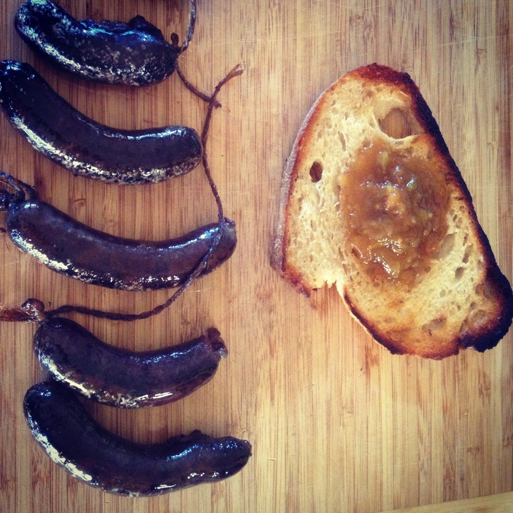 Cooked and fried blood sausage, Liv's sourdough and Kirsten's tomato relish made from last year's market garden bounty. A tribute to life and nourishment.