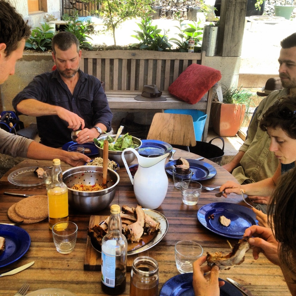 Harvest lunch after processing the first pig. We had a cake in honor of the pigs lives and toasted them roundly.