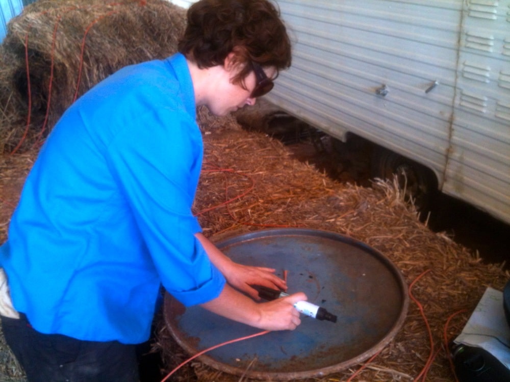 Gigi makes out the hole for the top of the outer drum