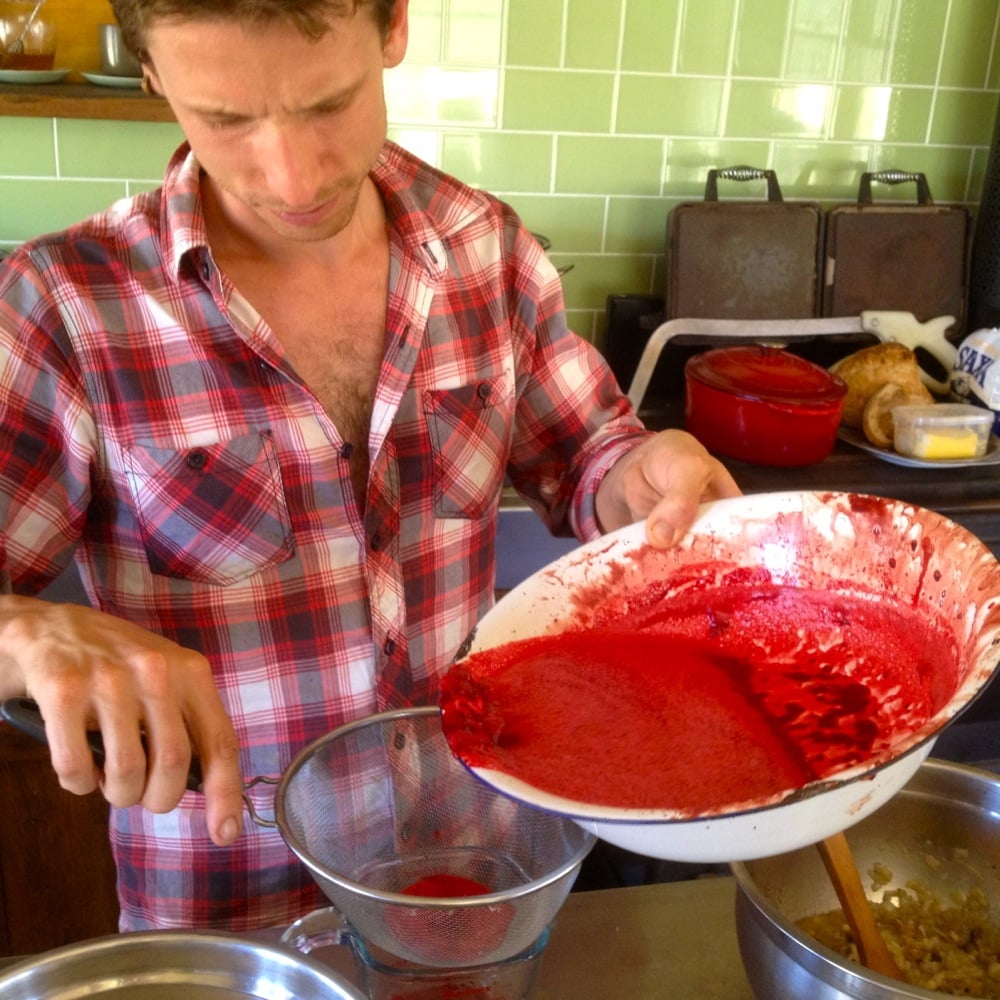 Liv sieves the whisked blood to remove any coagulations, before mixing with cream, spices, onions and diced fat