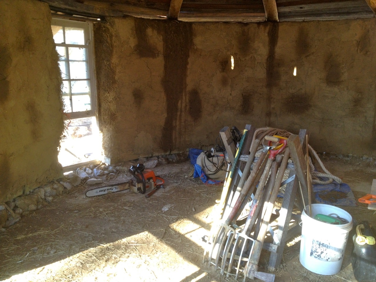 And the mud render on the inside walls were still drying...