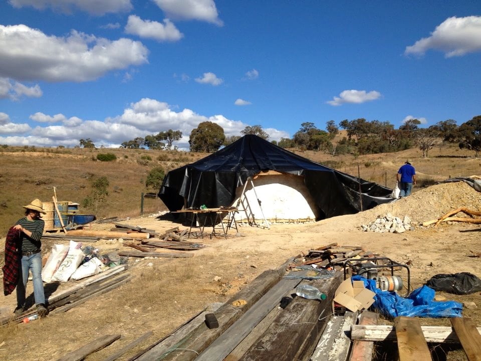 The roundhouse in darth vader mode. This will pass. Soon there will be soil on the roof, and then grasses waving in the breeze...