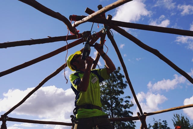 roundwood reciprocal roundhouse making at Milkwood's Natural Building course