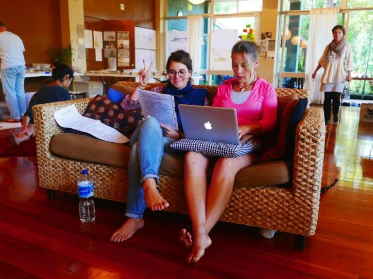 Students working on laptops during a course
