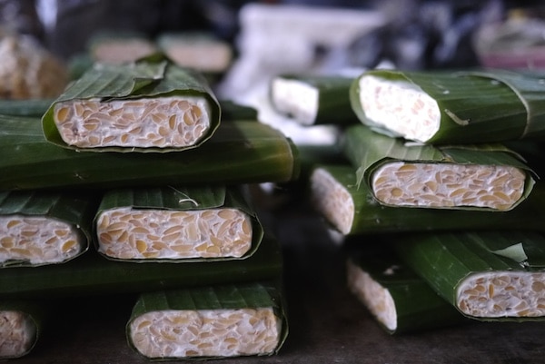 Tempeh wrapped in banana leaf