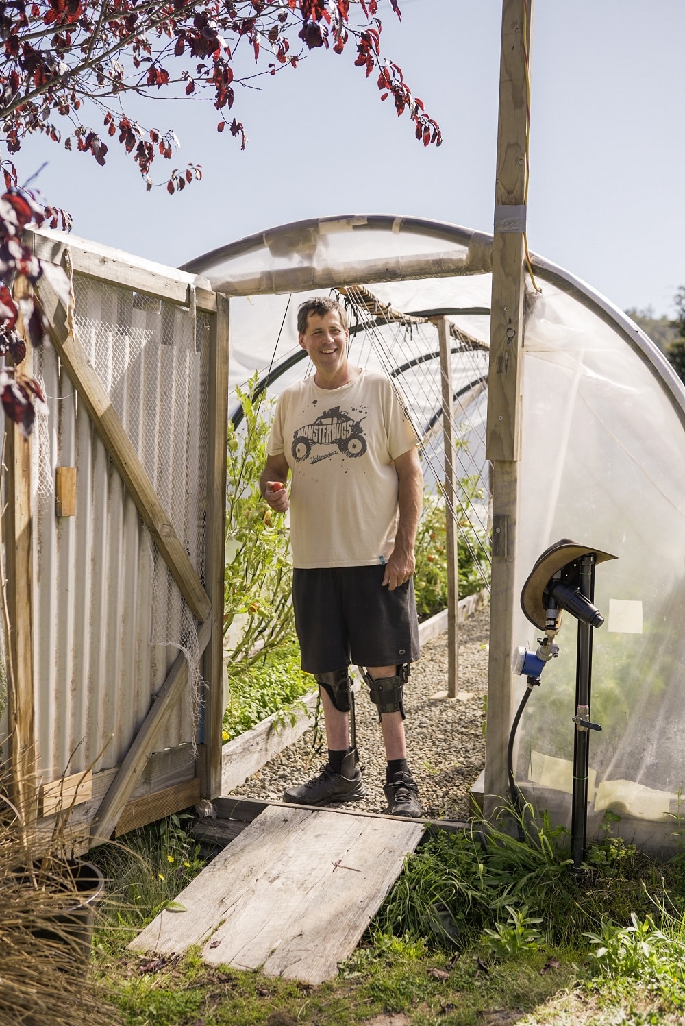 Grant enjoying his all-abilities veggie garden.