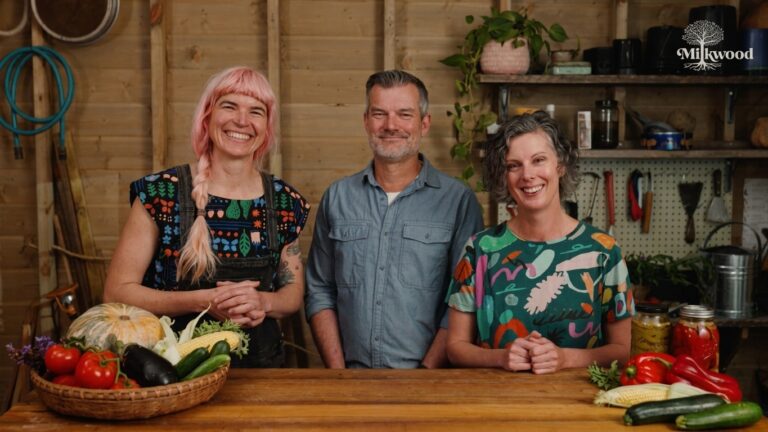 Hannah Moloney, Nick Ritar and Kirsten Bradley in the Organic Vegetable Gardening course studio, with baskets of home-grown veggies