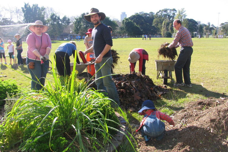 happy nick Nick and volunteers planting a garden bed at the Alexandria permablitz