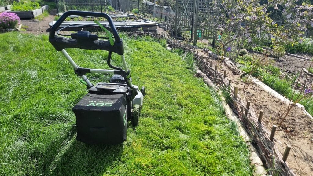 Mowing the lawn with the catcher on